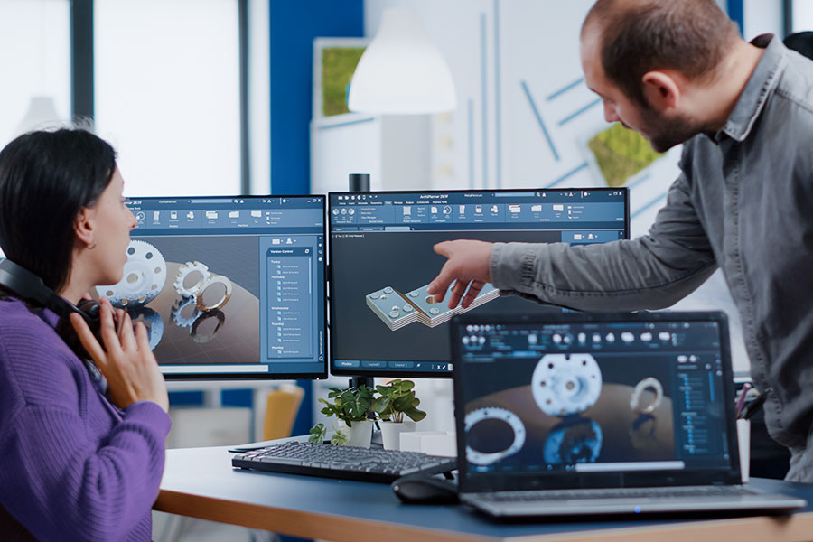 Two people having a conversation of a product design on a computer screen